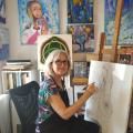 Mahé Ros devant sa toile pour une première étape, le dessin